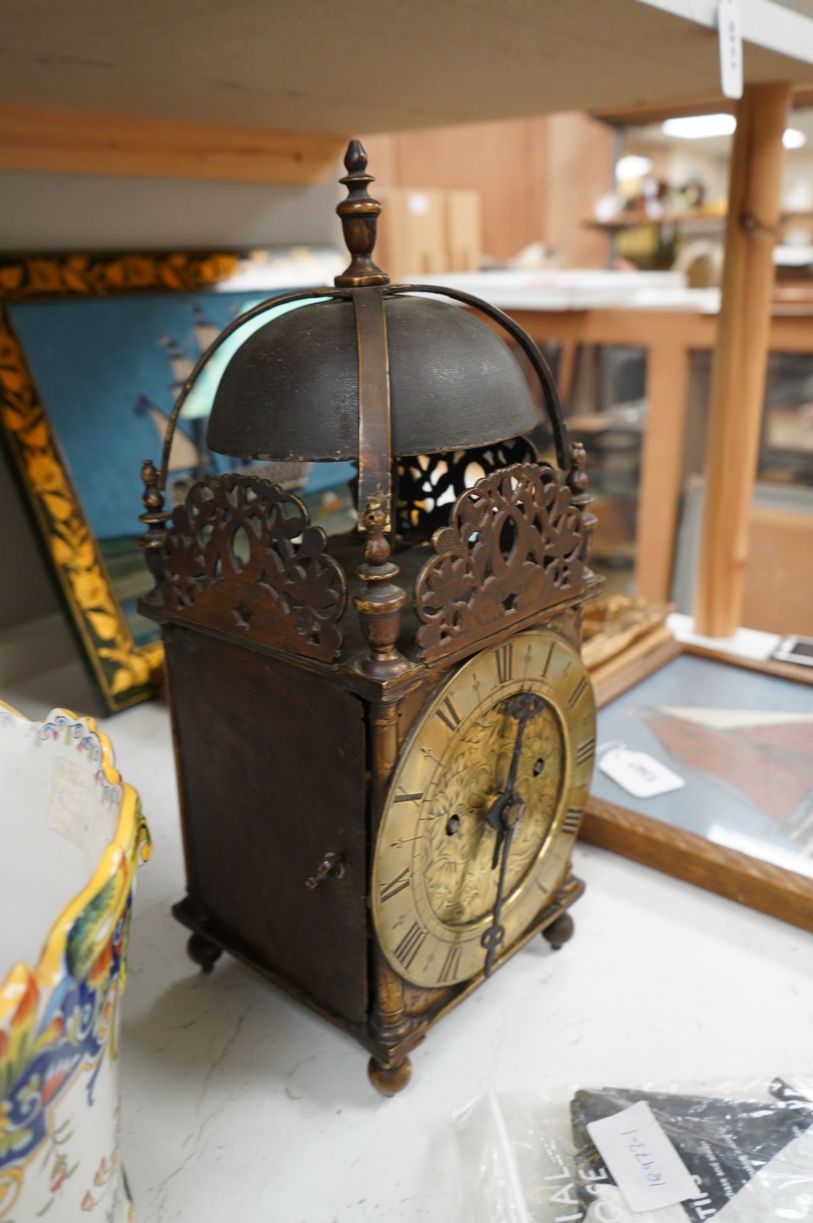 A 19th century brass lantern clock with engraved dial, twin fusee movement pendulum and key, 39cm high
